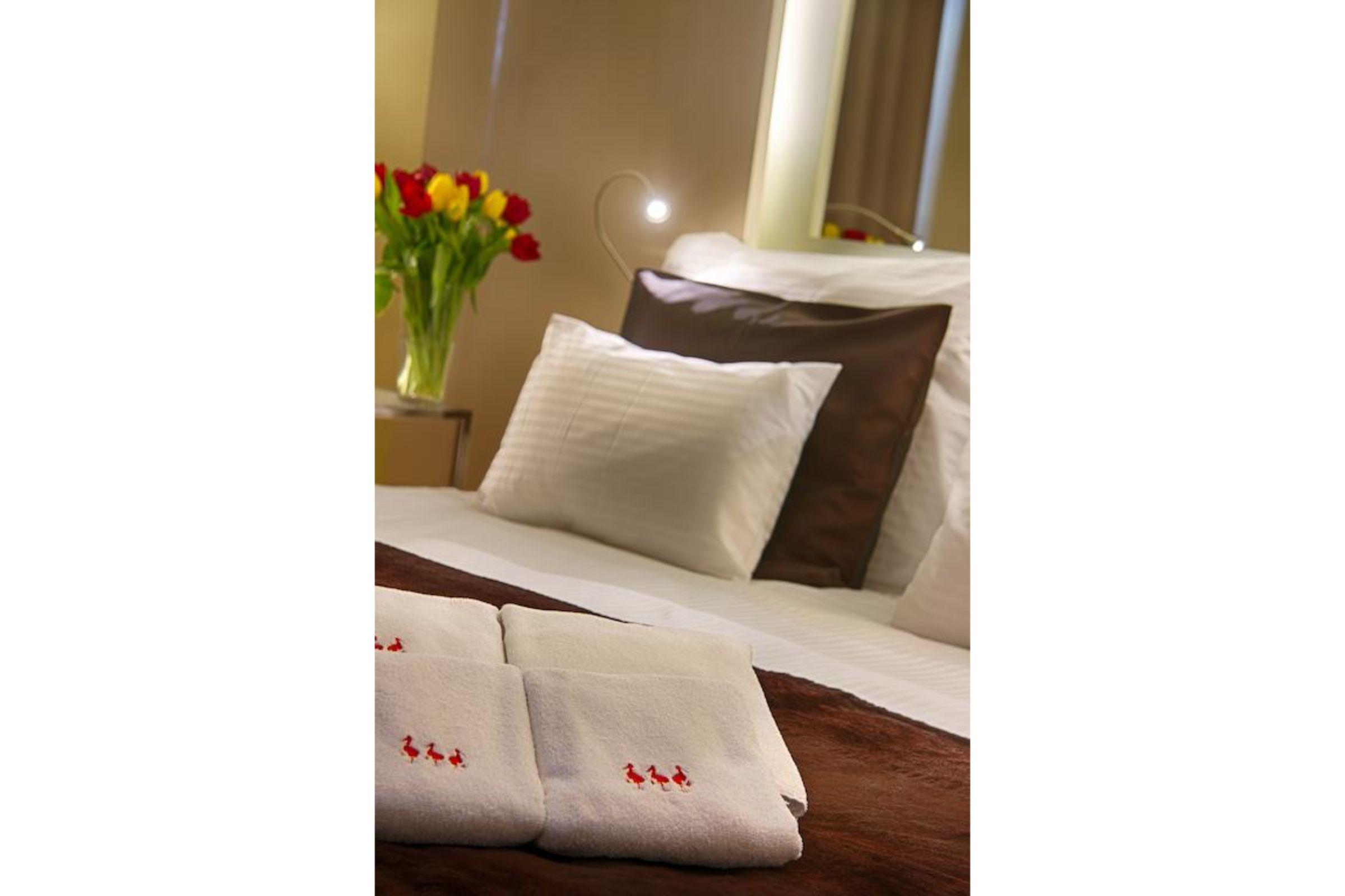 Three Storks Hotel Prague Exterior photo A bed with pillows