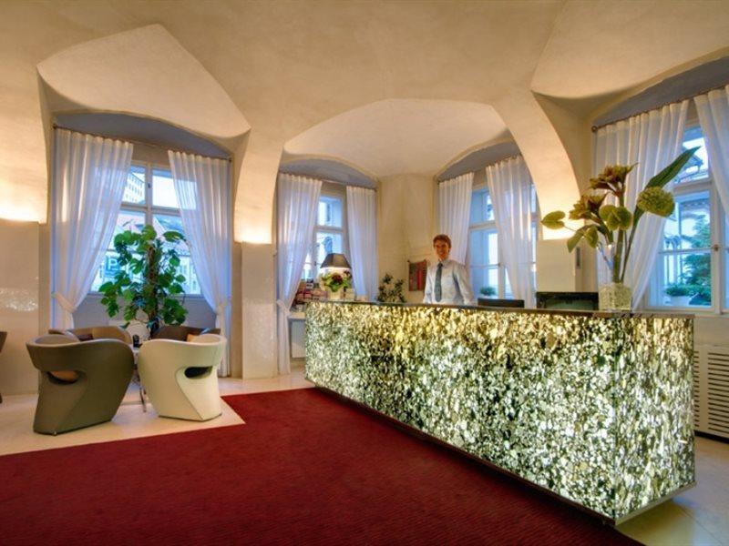 Three Storks Hotel Prague Exterior photo Reception desk at the Hotel Axelmannstein